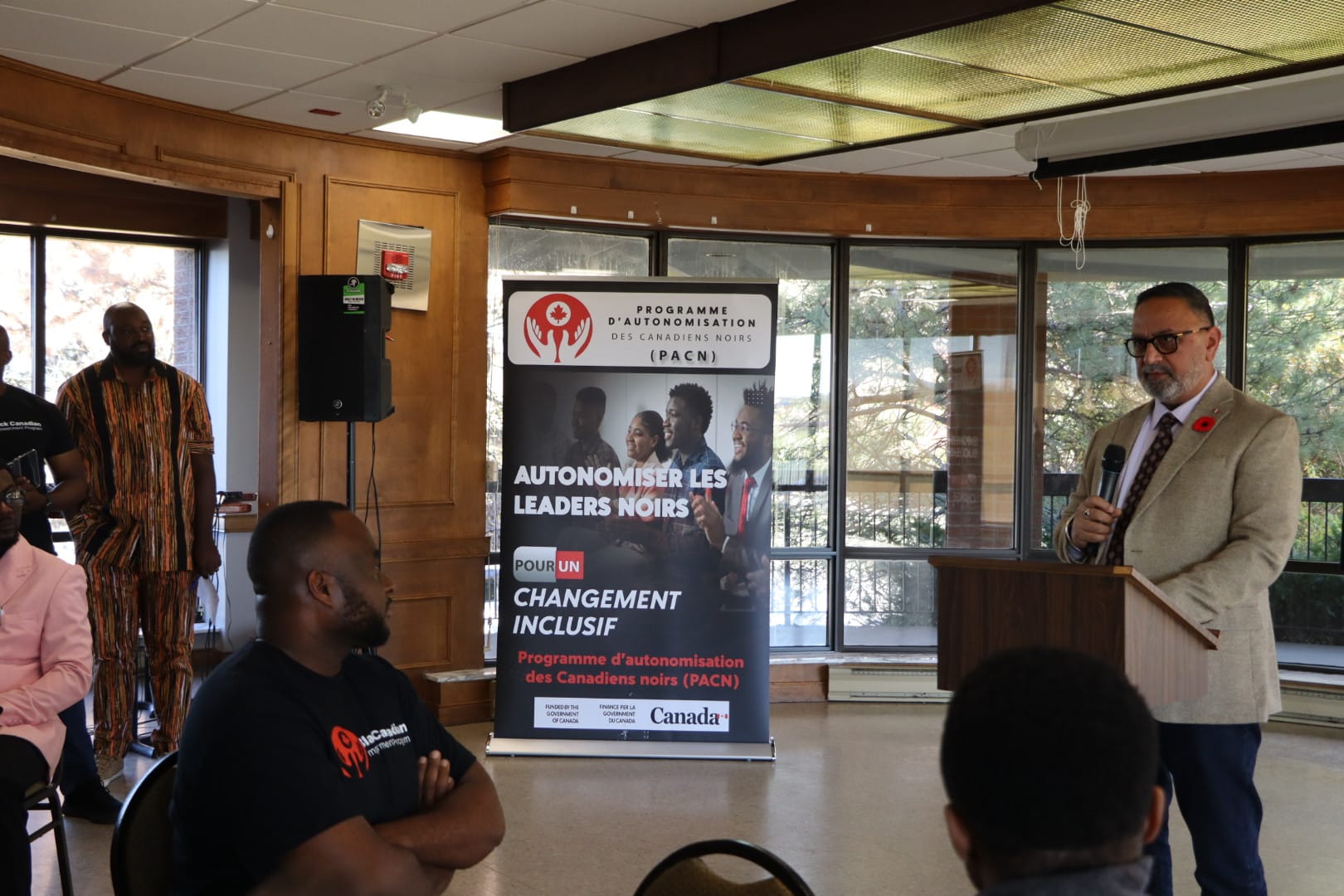 MP Harb Gill delivering a key note address and ED BCEP looks on